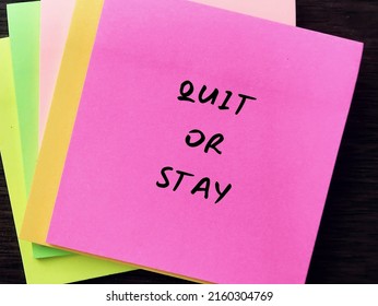 Note Pad With Handwritten Text QUIT OR STAY, Concept Of Decision Making To Stay Or Leave Job Or Relationship, To Resign Or To Continue Working