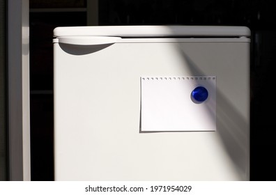 Note Paper Blank On Fridge With Glass Magnet, Sunlight, Copy Space