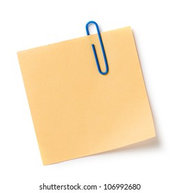 Note With A Paper Clip. Isolated On A White Background With A Shadow