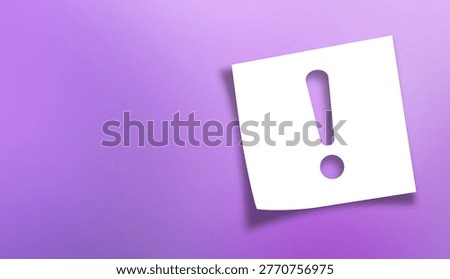 Note paper with exclamation mark on panoramic purple background