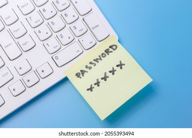 note paper of password key sticked on keyboard computer, security password management
