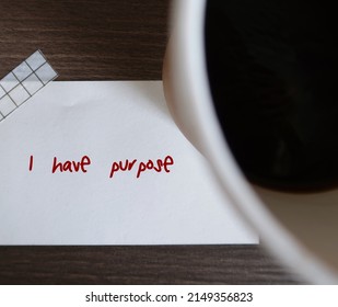 Note Stick On Coffee Desk With Affirmation Message I HAVE PURPOSE, Concept Of Phrases Statements Repeated To Help Challenge Negative Thoughts, Encourage Self Worth And Raise Self Esteem