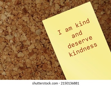 Note Stick On Cork Board With Message I AM KIND AND DESERVE KINDNESS, Concept Of Positive Affirmation Self Talk To Raise Self Esteem, Challenge Negative Perception, Boost Self Respect And Acceptance  