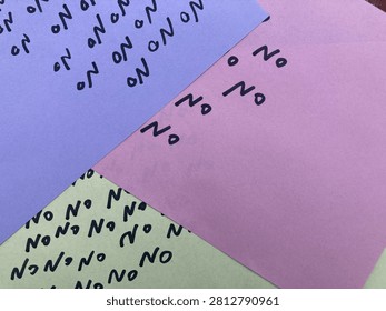 note with word no repeated multiple times, note with word no, Purple sticky note with word no, Pink note with word no