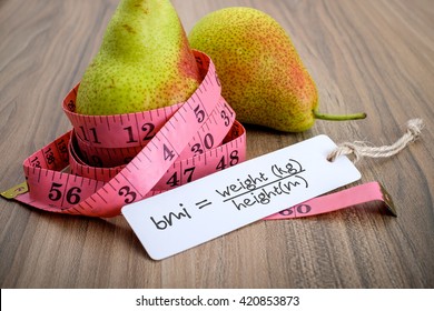 Note written: BMI (body mass index) formula, health conceptual