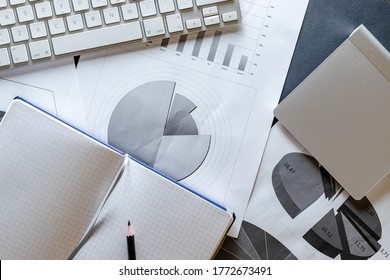 Notebook background. Charts graphs diagram in office. Finance control and analysis concept. Concept image of data gathering and statistical working.