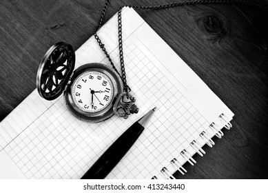 Notebook Blank Page, Pen, Vintage Pocket Watch On Wooden Background