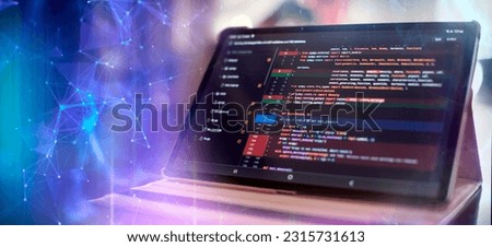 Notebook closeup photo. CSS, JavaScript and HTML usage. Monitor closeup of function source code. Abstract IT technology background.