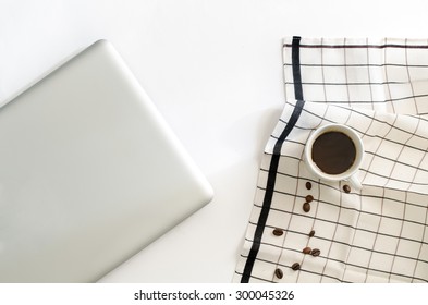 Notebook with coffee cup