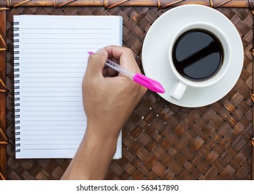 notebook and coffee on table, Diary of staff