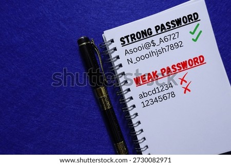 Notebook comparing strong and weak passwords with a pen