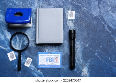 Notebook With Document Of FBI Agent And Accessories On Color Background