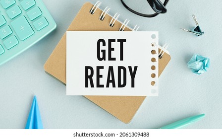 Notebook With GET READY Word With Office Tools On White Table. Business Conceptual