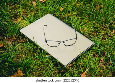 notebook and glasses