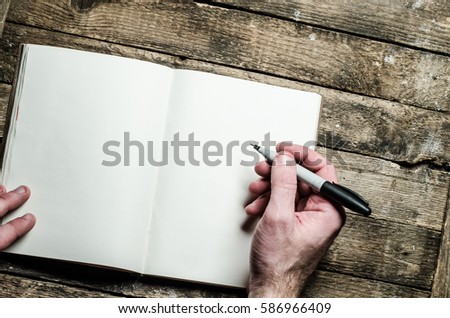 notebook and hands