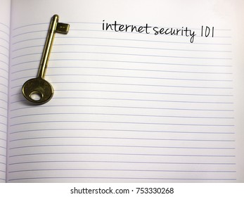 notebook with a key and the text internet security and plenty of copy space below