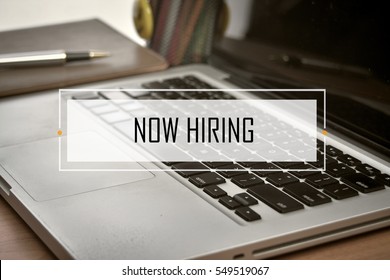 Notebook And Laptop With Text NOW HIRING