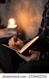 A notebook in a man's hands