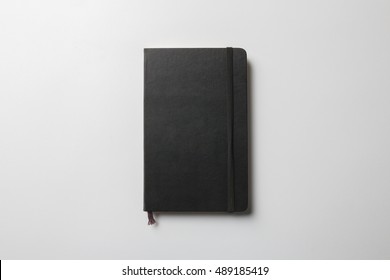 Notebook Mock-up with elastic band closure, ready to replace your design.