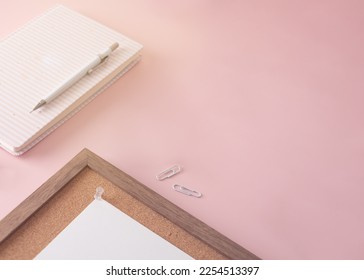 Notebook and office bulletin board or back to school, pink background, copy space - Shutterstock ID 2254513397