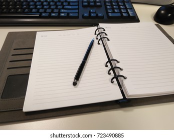 notebook at office desk