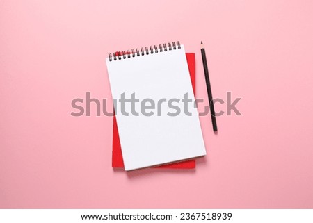 notebook on a colored background, space for text
