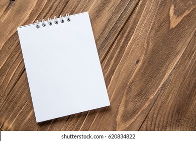 Notebook on wooden background