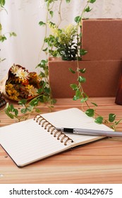 Notebook and pen