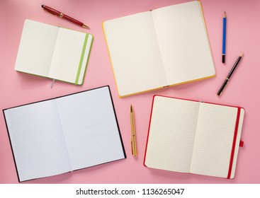 notebook and pen at abstract background surface