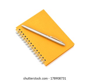 Notebook With Pen On White Background