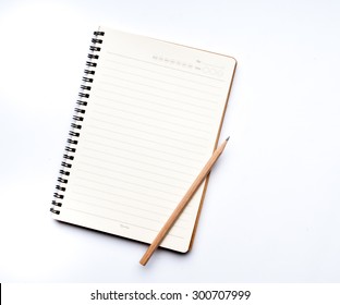 Notebook With A Pencil