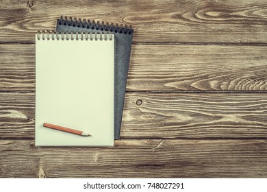 Notebook with pencil