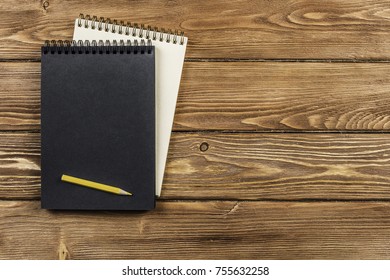Notebook with pencil