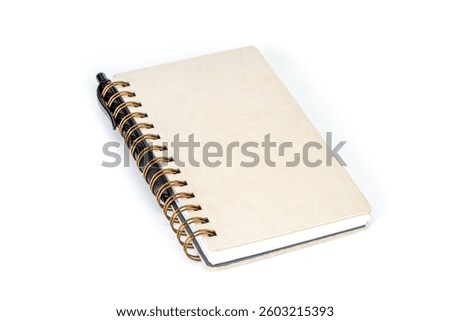 Notebook: A pristine notebook sits at an angle, its blank cover promising countless ideas and sketches, ready to capture thoughts and inspirations on white blackground.