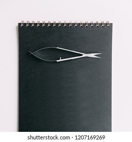 Notebook and notebook in the set. Cut out the background and Flatley. Workplace blogger makeup artist eyebrow.