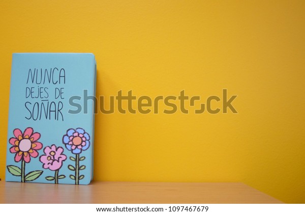 Notebook Spanish Text On Wooden Desk Stock Photo Edit Now 1097467679