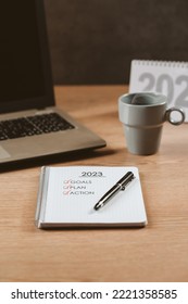 Notebook With A To-do List For The Year 2023, Calendar, A Laptop And A Hot Coffee - Concept, Goals And Action Plan, New Year