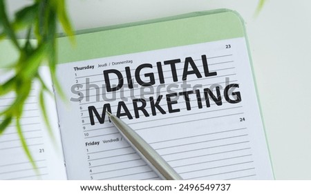 Notebook with Tools and Notes about Digital Marketing, concept