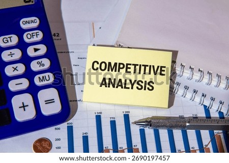 Notebook with Tools and Notes with text COMPETITOR ANALYSIS