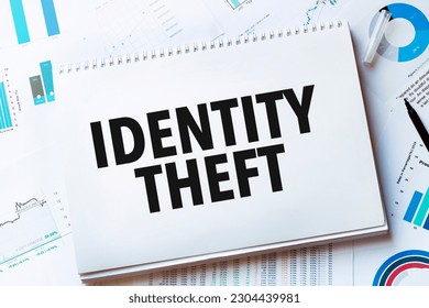 Notebook with Tools and Notes with text IDENTITY THEFT