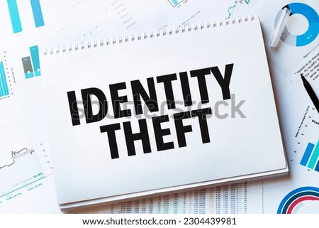 Notebook with Tools and Notes with text IDENTITY THEFT