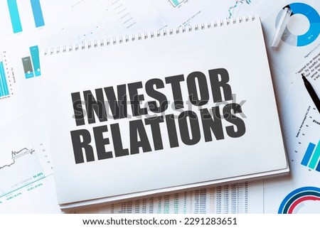 Notebook with Tools and Notes with text investor relations