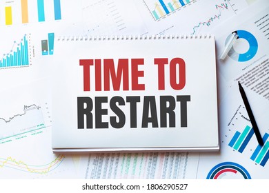 Notebook with Tools and Notes with text TIME TO RESTART