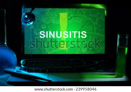 Notebook with words  Sinusitis , test tubes and stethoscope