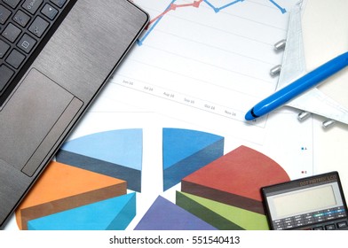 notebookpc, caculator, airplane on the graphs