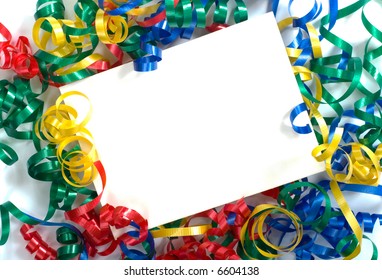 A notecard surrounded by primary colored curly ribbon, could be used for birthday, new years, school  or any celebration announcement