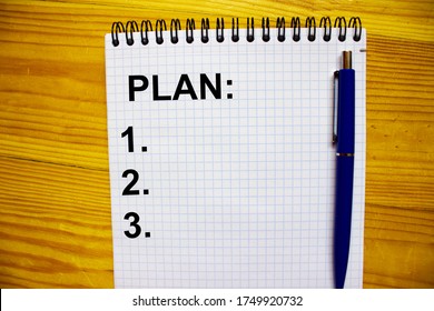 Notepad With A Blue Ballpoint Pen, Place For Your Text And An Action Plan For Items One, Two And Three On A Wooden Floor.