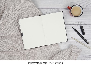 Notepad, Book, Planner, Journal, Diary Mockup For Text Or Design, Open Blank Notebook Top View, Flat Lay With Cozy Sweater And Coffee Cup.