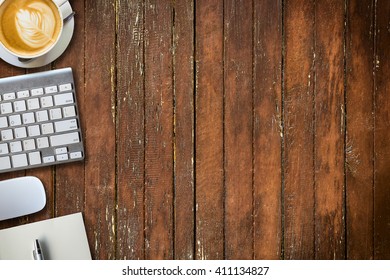 notepad, computer and coffee cup. View from above with copy space