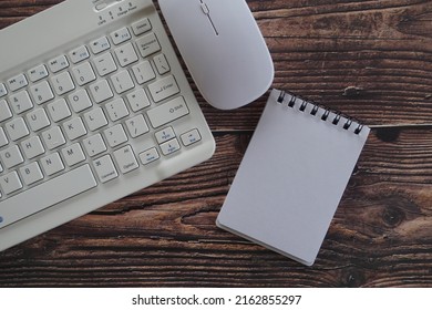 notepad and computer equipments on the table 